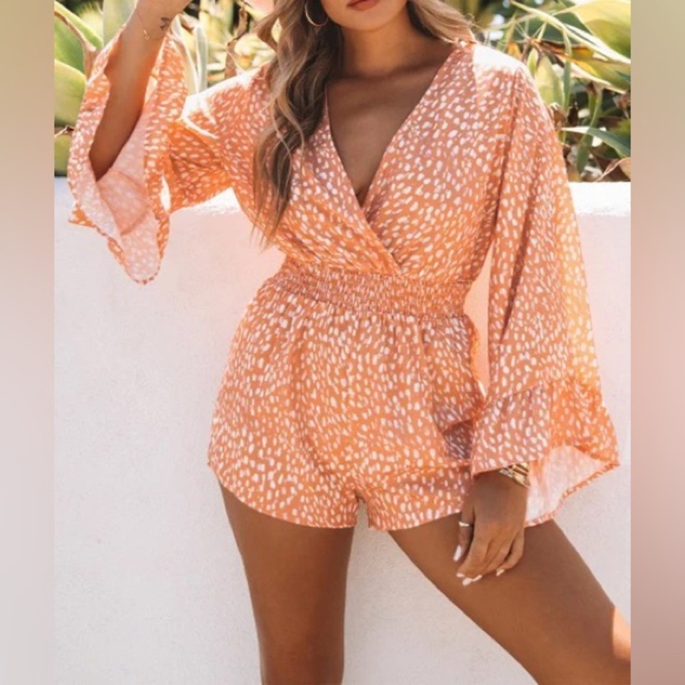 Pink and orange patterned romper